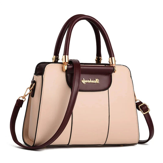 Multi-color structured satchel handbag collection with contrast trim and gold hardware displayed front-facing