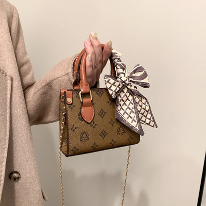 Monedero de piel auténtica marrón para mujer con forro de poliéster.