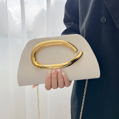 The Teryana Sculpted Gold Clutch
