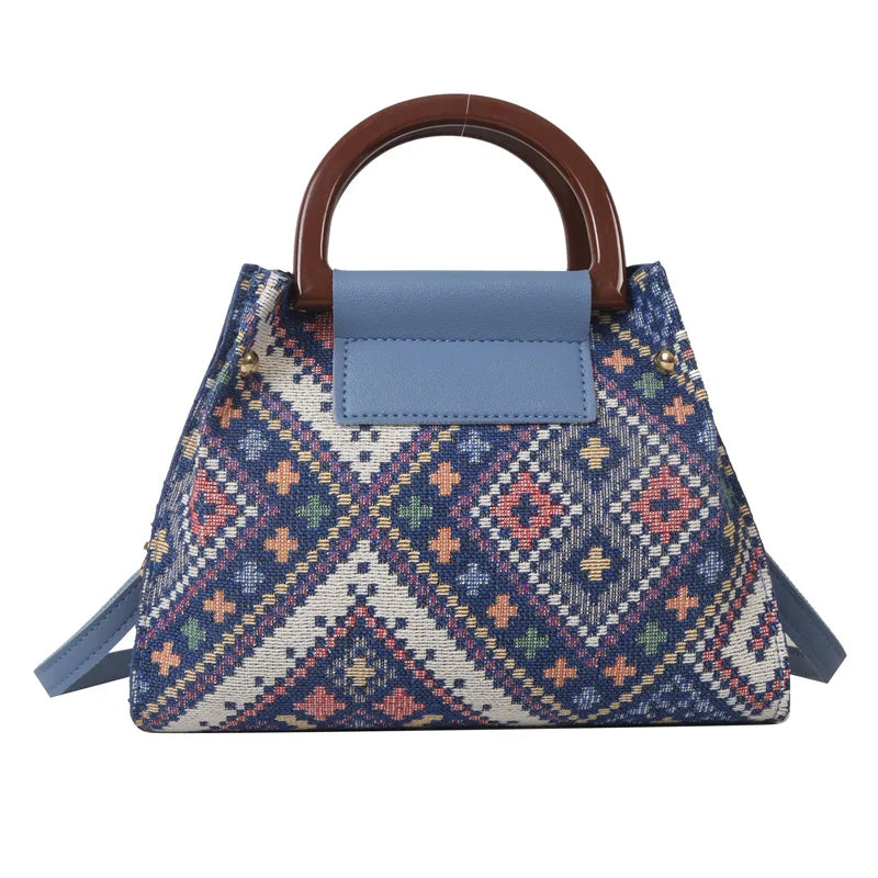 Geometric tapestry top handle handbag with colorful woven pattern and crossbody strap, stylish women’s vintage inspired purse