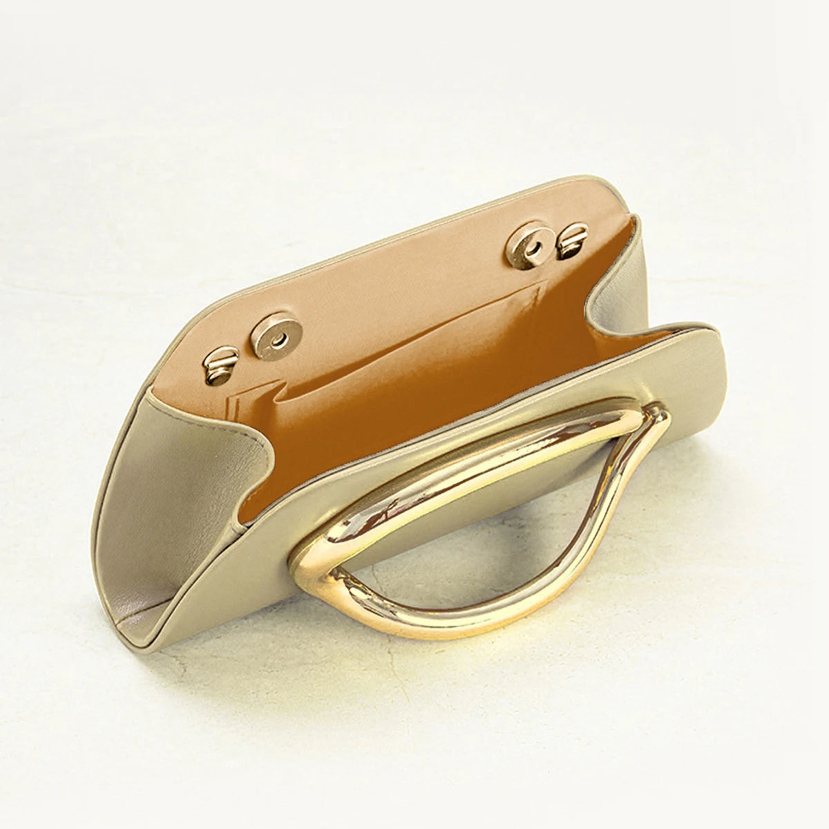 The Teryana Sculpted Gold Clutch