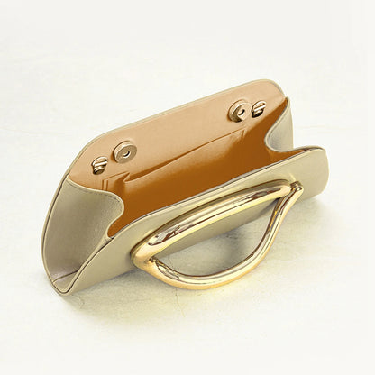 The Teryana Sculpted Gold Clutch