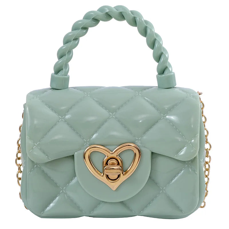 Mint green quilted mini handbag with braided handle and heart clasp, colorful women’s crossbody satchel purse