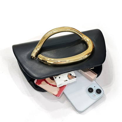 The Teryana Sculpted Gold Clutch