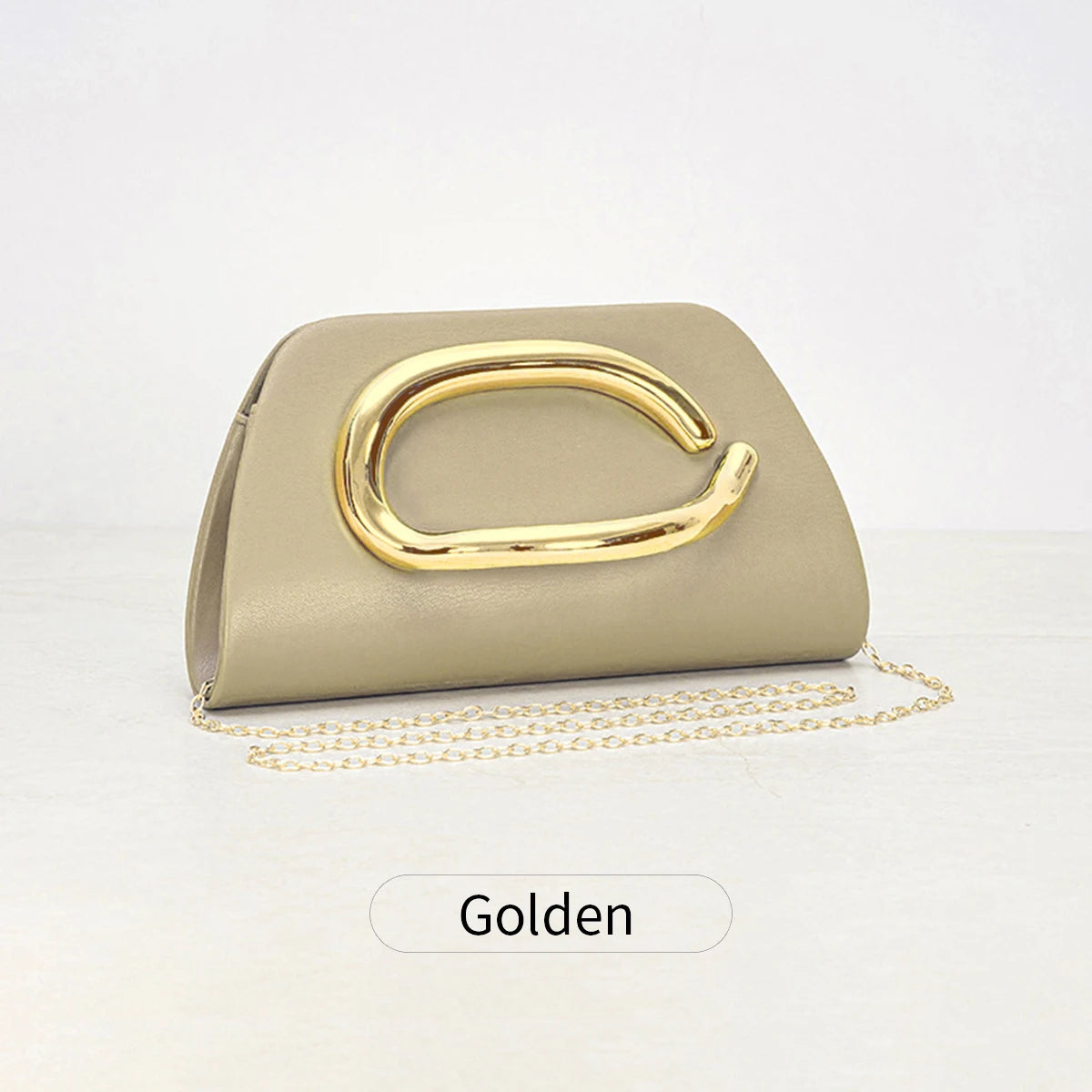 The Teryana Sculpted Gold Clutch