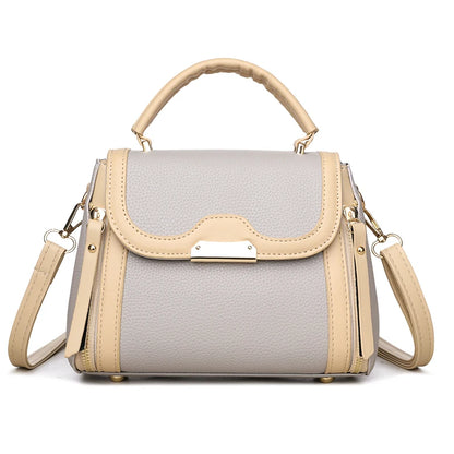 Structured women’s mini satchel showing organized interior compartment and top handle design, stylish PU leather handbag for everyday use