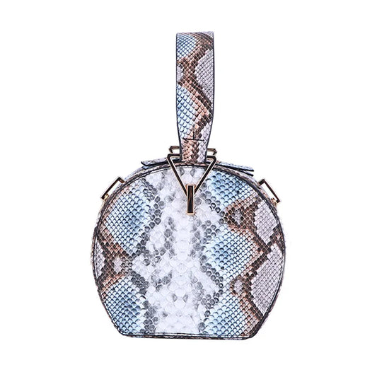 Round snakeskin pattern wristlet handbag with circular silhouette and top handle, stylish women’s statement handbag