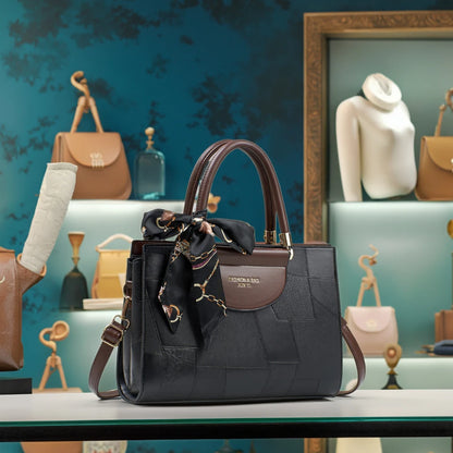 Black structured women tote handbag with hollow cutwork detail silk scarf accent and top handle modern everyday purse