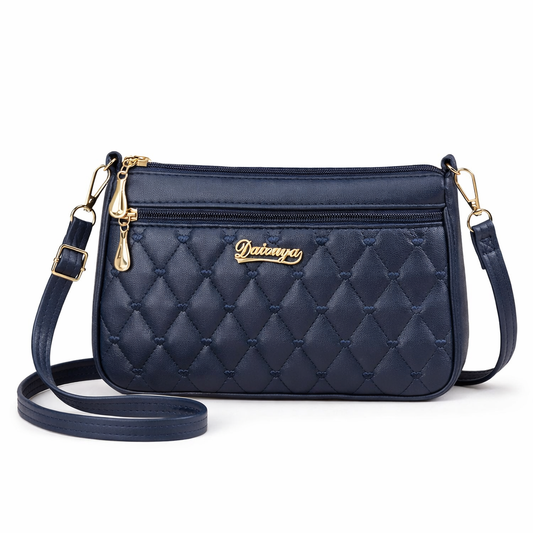 Navy quilted handbag with gold accents on a white background