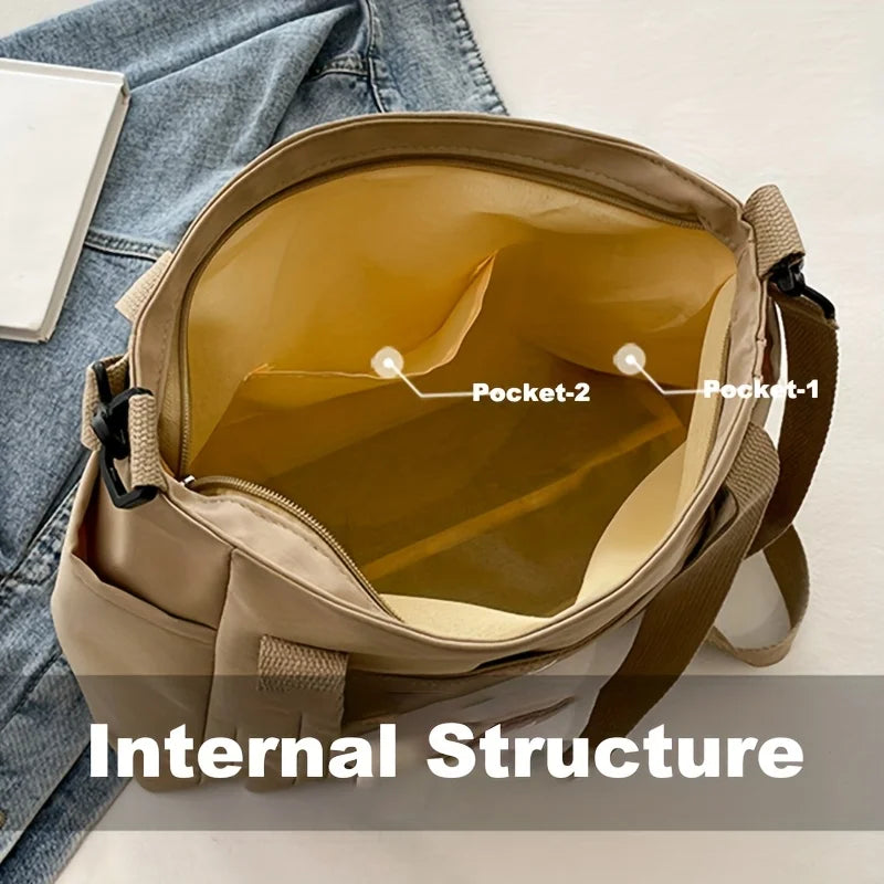 Beige women's nylon tote bag interior with zipper pocket and phone compartment organized everyday carry handbag