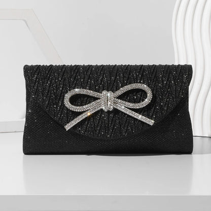 Black satin evening clutch with rhinestone bow detail and chain strap elegant women formal party purse