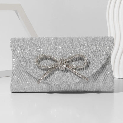 The Noir Éclat Satin Bow Clutch