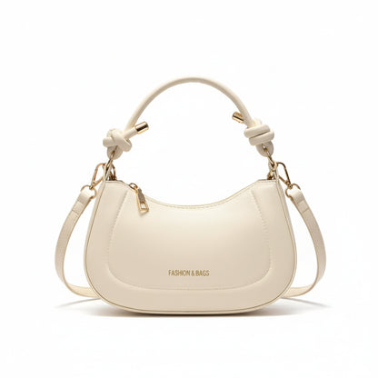 Minimalist crescent shoulder bag in smooth PU leather with adjustable strap and zipper closure, elegant women’s everyday handbag