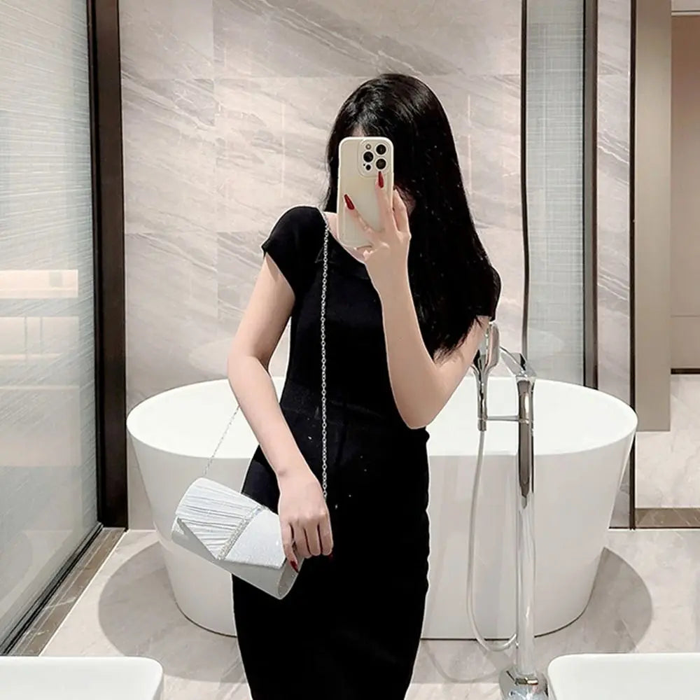 The Aurora Pleated Evening Clutch