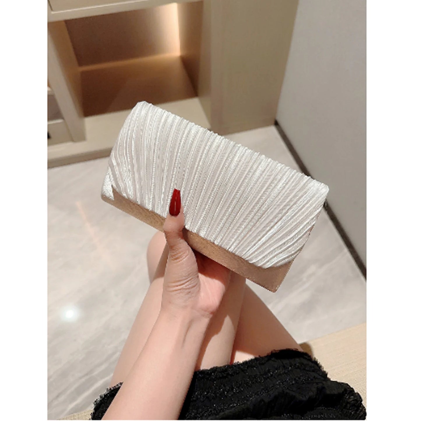 The Ivory Title Pleated Clutch