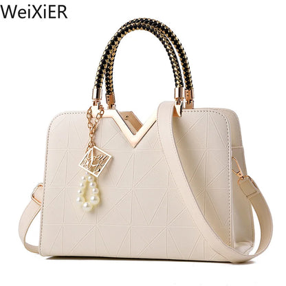 Structured women’s satchel bag with detachable shoulder strap and organized interior compartments, modern fashion handbag