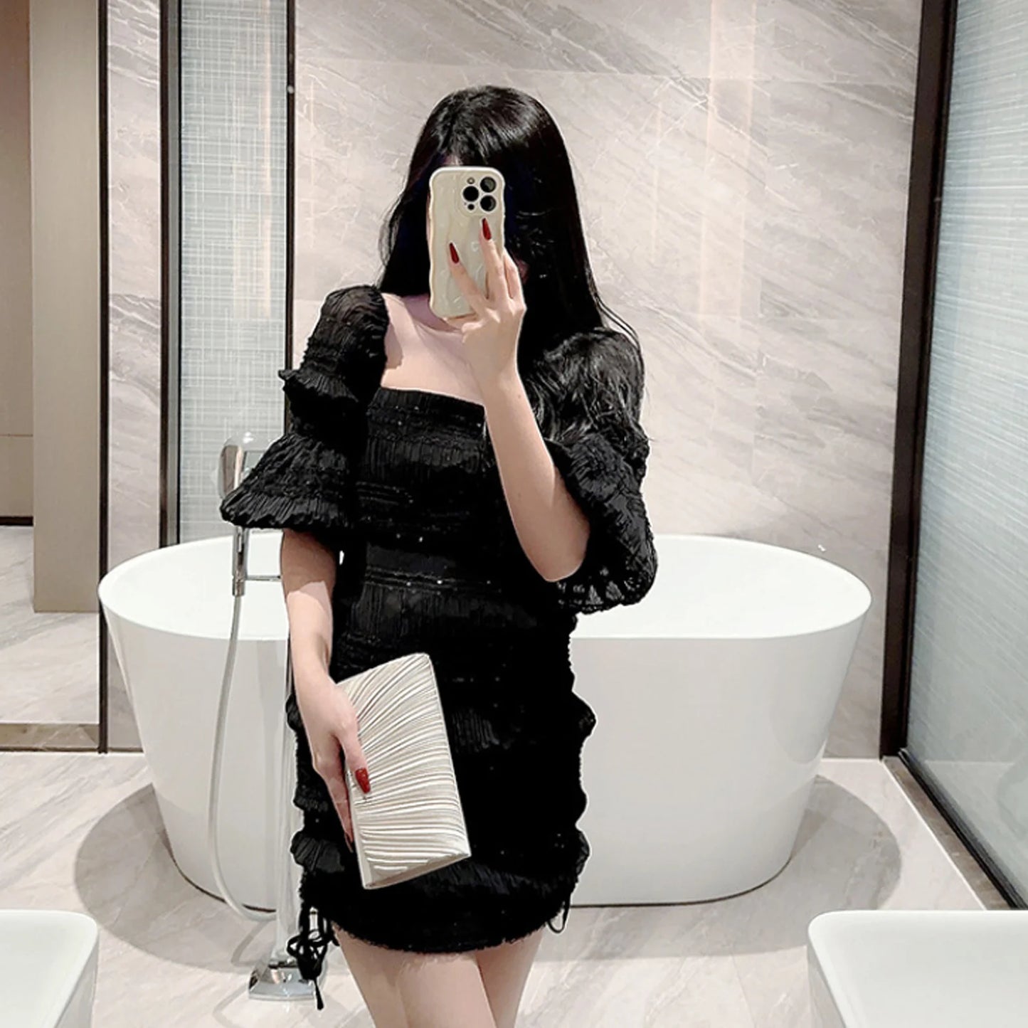 The Ivory Title Pleated Clutch