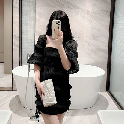 The Ivory Title Pleated Clutch