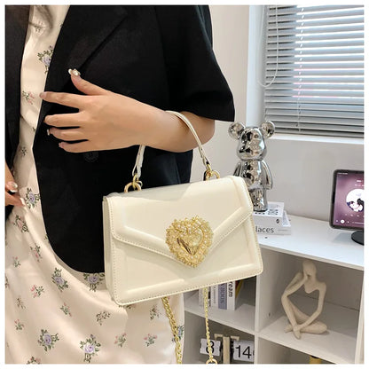 Bolso de mano de diseñador con cadena cruzada informal y temperamento