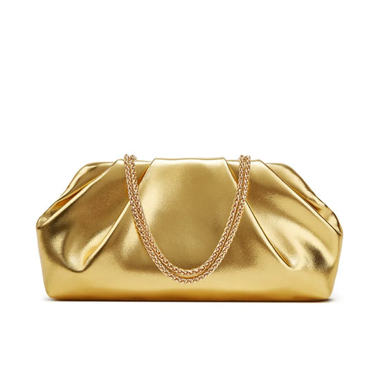 Gold metallic soft clutch handbag with chain strap structured evening purse for women on white background elegant statement bag