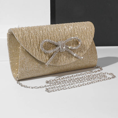 The Noir Éclat Satin Bow Clutch