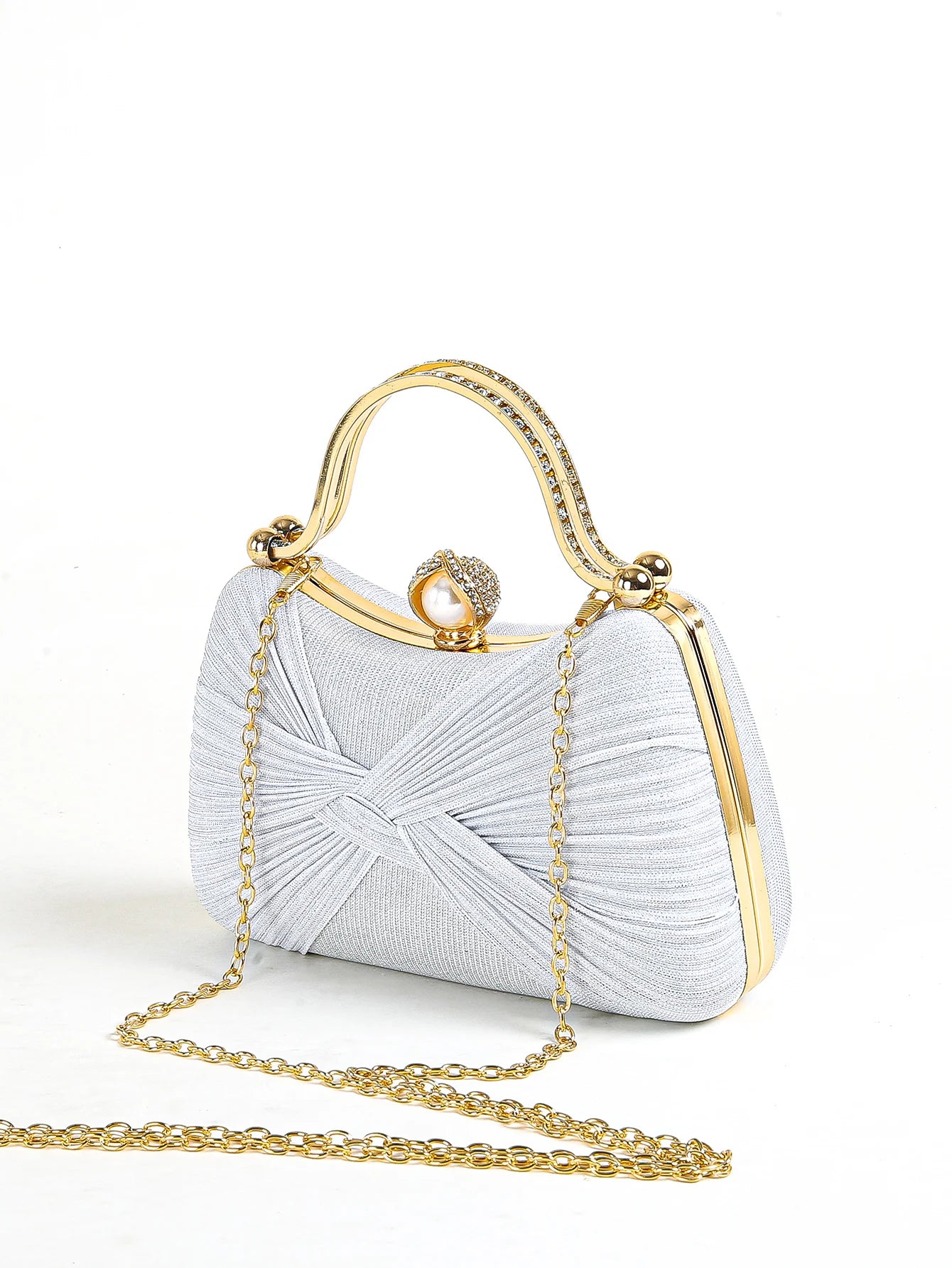 Silver textured evening clutch with gold top handle and chain strap, elegant women’s formal handbag for weddings and parties