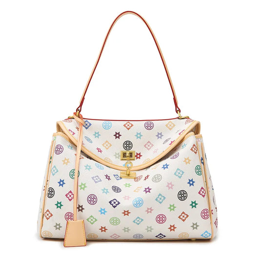 White monogram print shoulder tote bag with tan strap and structured silhouette, stylish women’s everyday fashion handbag