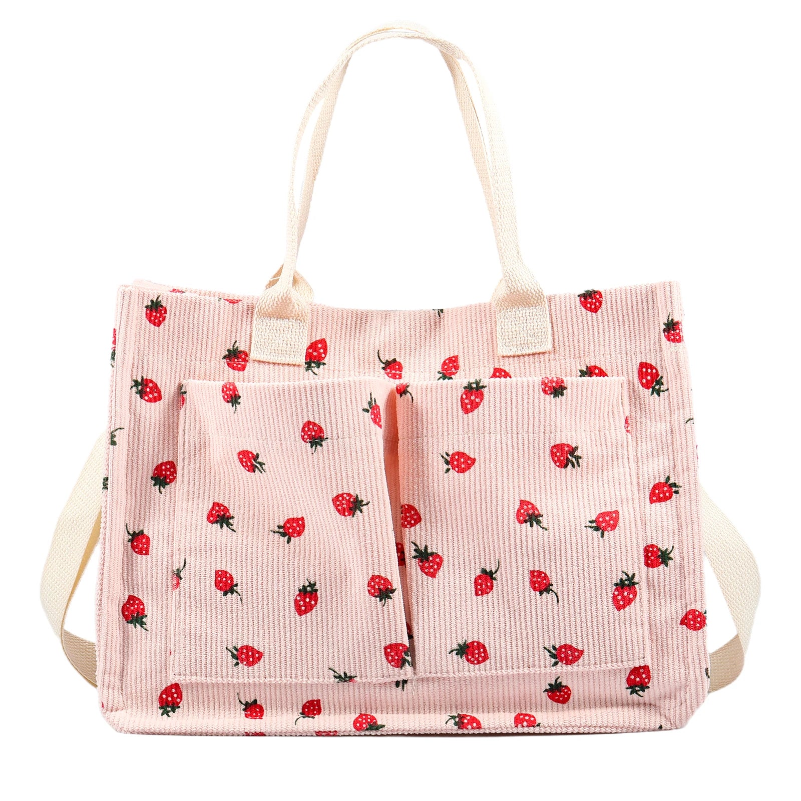 Pink strawberry print canvas tote bag with front pockets and cream shoulder straps, cute aesthetic shopper bag isolated on white background