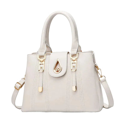 White structured women tote handbag with gold teardrop lock hardware top handles and crossbody strap elegant everyday purse