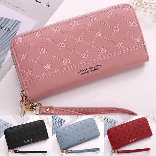 Elegant long zip wallet open showing card holders and organized compartments feminine luxury style