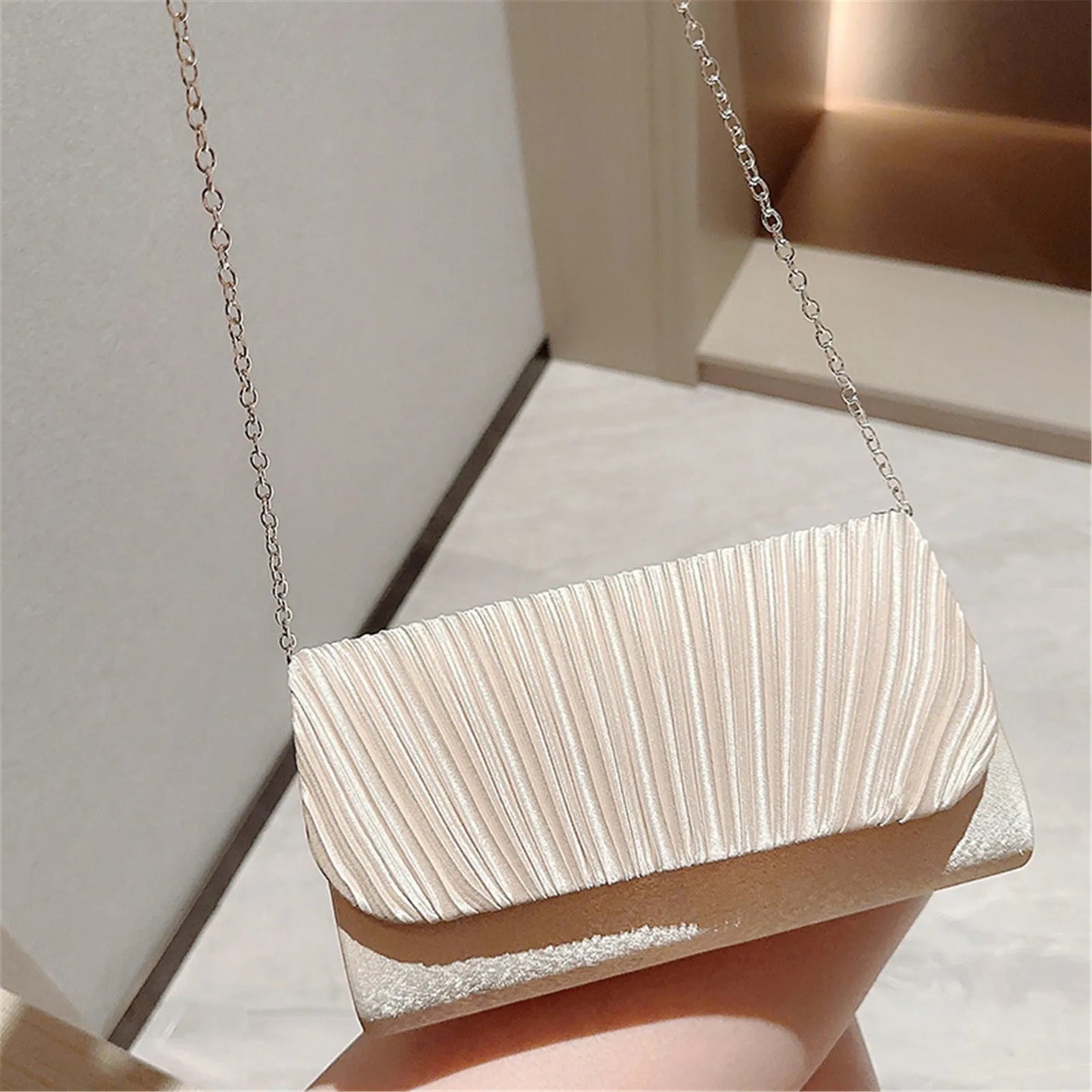 White ruched hard shell evening clutch with chain strap elegant women's party purse side angle