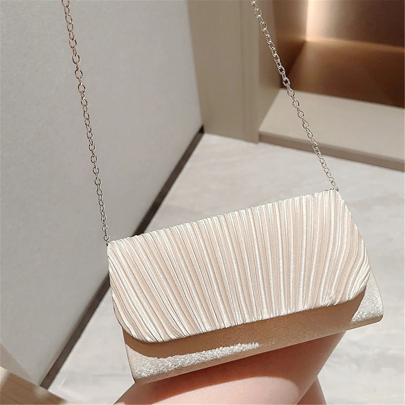 White ruched hard shell evening clutch with chain strap elegant women's party purse side angle