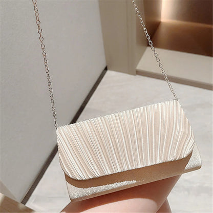 White ruched hard shell evening clutch with chain strap elegant women's party purse side angle